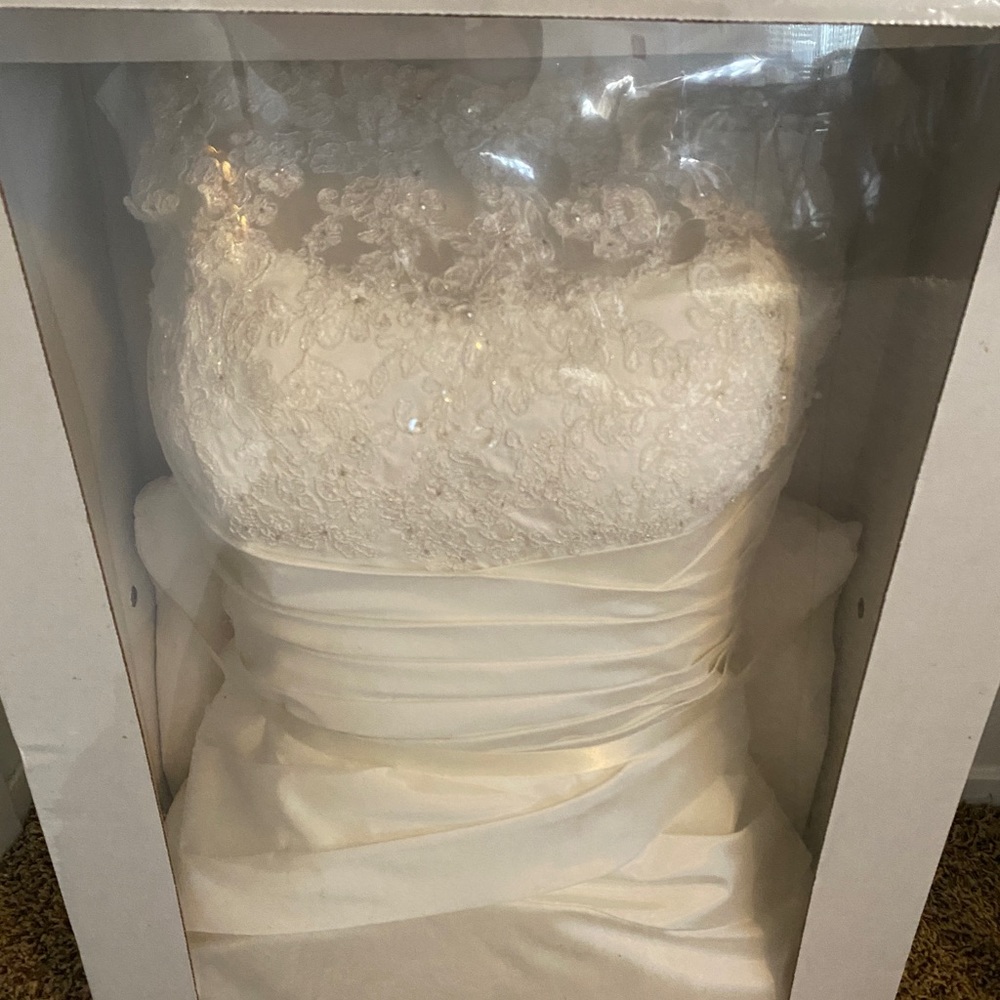 Wedding dress for sale From David’s Bridal, preserved in box message me